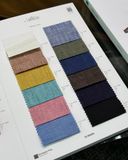 Fabric color swatch chart with various colored swatches on a white background
