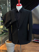 Huddersfield Fine Worsteds Super Black bespoke suit