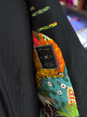 Single-button black bespoke jacket with structured shoulders