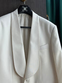 Close up of cream white suit jacket, made-to-measure in premium wool blend.