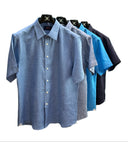 Set of four short-sleeve shirts in different shades of blue made from premium linen fabrics.