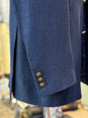 Hand-stitched Milanese buttonhole on Holland & Sherry fabric jacket