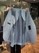 Patch pocket detail on an unstructured full canvas bespoke jacket