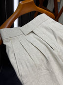 Luxury Italian linen-cotton trousers with double pleated front and corozo buttons