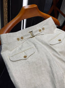 Relaxed fit Den Vi trousers with back-buckle detail