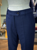 Bespoke women’s suit with sculpted feminine waistline