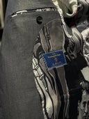 Back view of a ZEGNA 15milmil15 bespoke jacket with side vents