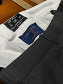 Tailored trousers with a bespoke curtained waistband by WH Bespoke