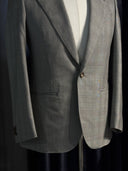 Grey check tailored jacket with hand stitched Milanese buttonhole  | WH Bespoke