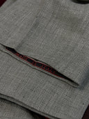 Extended waistband on sage green bespoke trousers
